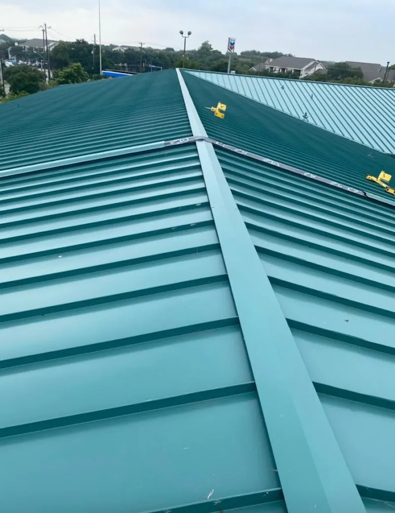Green commercial metal roof ridge and valley for Metal Roof Repair in Handy